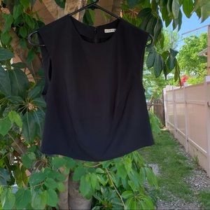 Alice + Olivia black top with a zipper on the back!